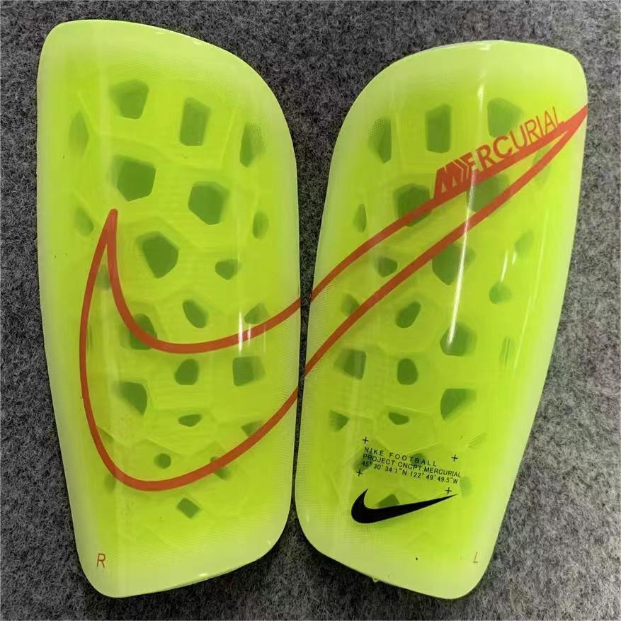 Caneleira Nike