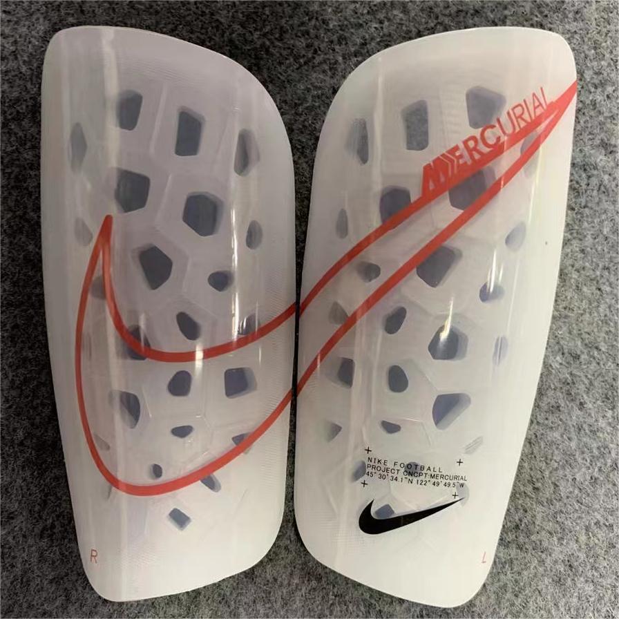 Caneleira Nike
